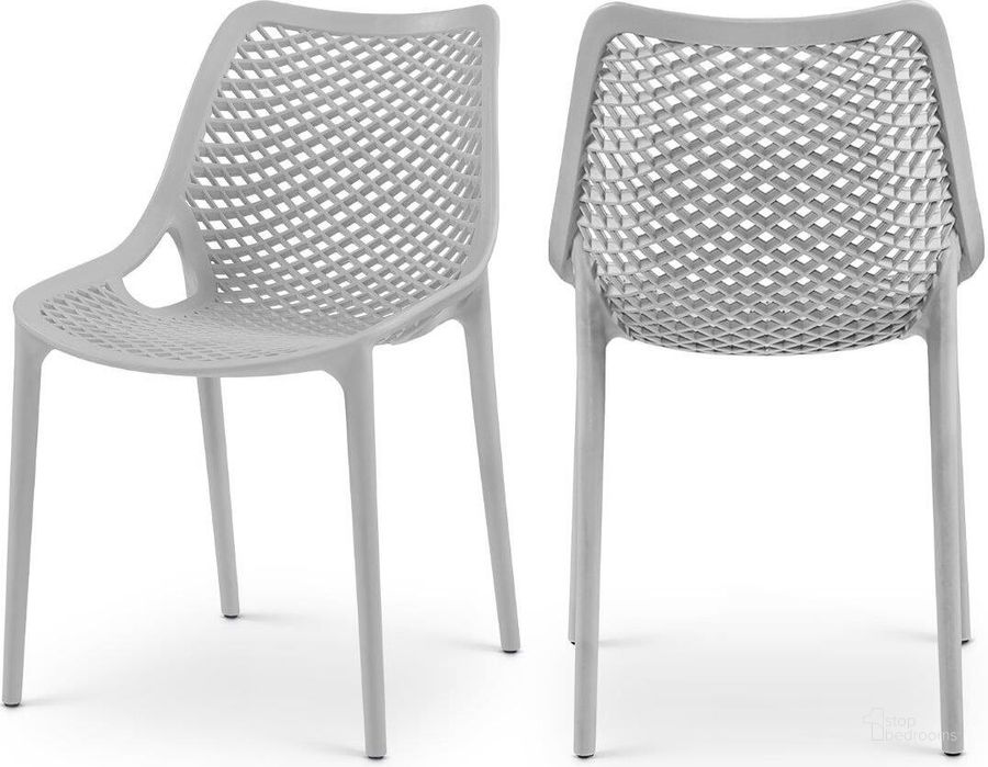 The appearance of Mykonos Grey Outdoor Patio Dining Chair Set of 4 328Grey designed by Meridian in the modern / contemporary interior design. This grey piece of furniture  was selected by 1StopBedrooms from Mykonos Collection to add a touch of cosiness and style into your home. Sku: 328Grey. Material: Polypropylene. Product Type: Outdoor Dining Chair. Image1
