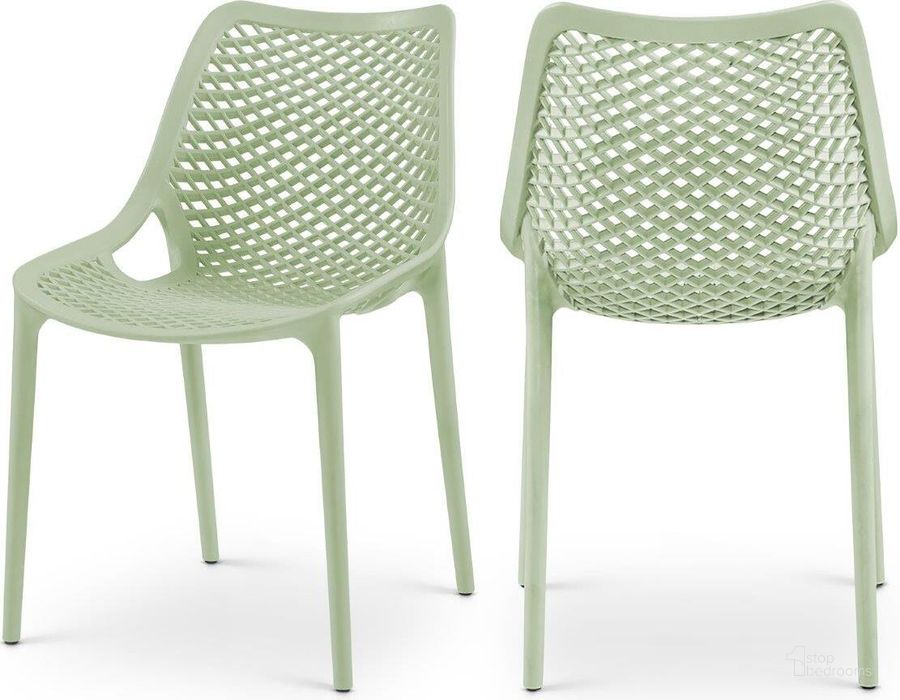 The appearance of Mykonos Mint Outdoor Patio Dining Chair Set of 4 328Mint designed by Meridian in the modern / contemporary interior design. This mint piece of furniture  was selected by 1StopBedrooms from Mykonos Collection to add a touch of cosiness and style into your home. Sku: 328Mint. Material: Polypropylene. Product Type: Outdoor Dining Chair. Image1