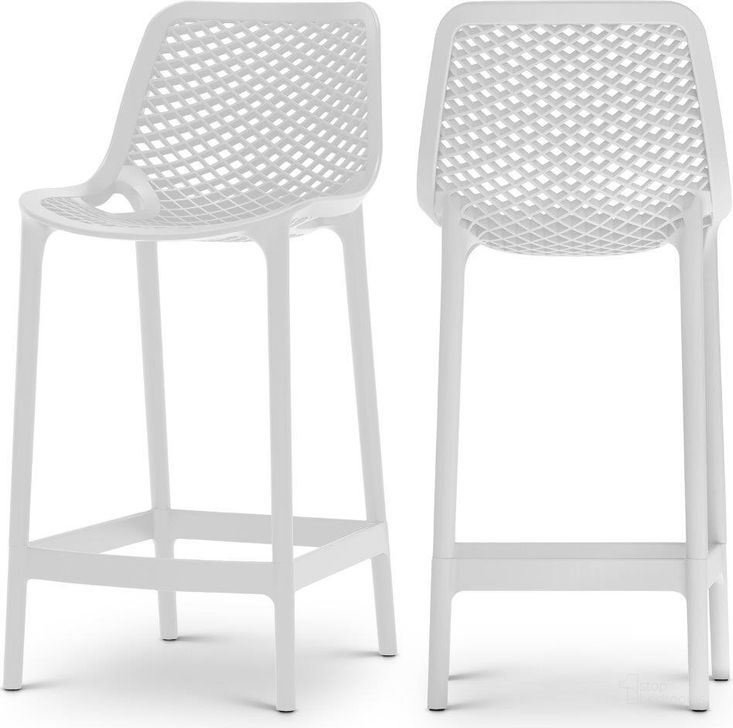 The appearance of Mykonos White Outdoor Patio Stool Set of 4 designed by Meridian in the modern / contemporary interior design. This white piece of furniture  was selected by 1StopBedrooms from Mykonos Collection to add a touch of cosiness and style into your home. Sku: 330White. Material: Polypropylene. Product Type: Outdoor Chair. Image1