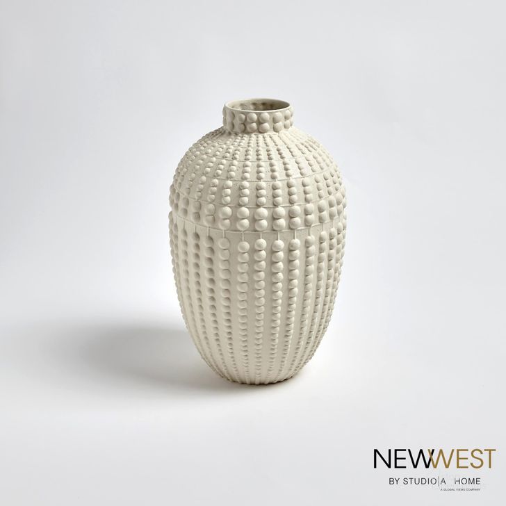 The appearance of Nail Head Small Vase In Rustic White designed by Global Views in the modern / contemporary interior design. This white piece of furniture  was selected by 1StopBedrooms from Nail Collection to add a touch of cosiness and style into your home. Sku: NW7.10010. Material: Ceramic. Product Type: Vase. Image1