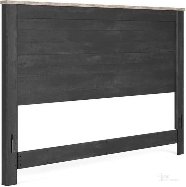 The appearance of Nanforth Graphite King/California King Panel Headboard Only designed by Signature Design by Ashley in the traditional interior design. This graphite piece of furniture  was selected by 1StopBedrooms from Nanforth Collection to add a touch of cosiness and style into your home. Sku: B3670-58. Material: Wood. Product Type: Headboard. Bed Size: King. Image1