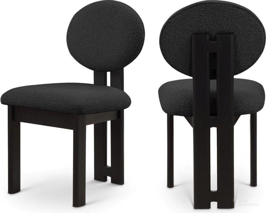 The appearance of Napa Black Boucle Fabric Dining Chair Set of 2 490Black-C designed by Meridian in the transitional interior design. This black piece of furniture  was selected by 1StopBedrooms from Napa Collection to add a touch of cosiness and style into your home. Sku: 490Black-C. Product Type: Dining Chair. Material: Rubberwood. Image1