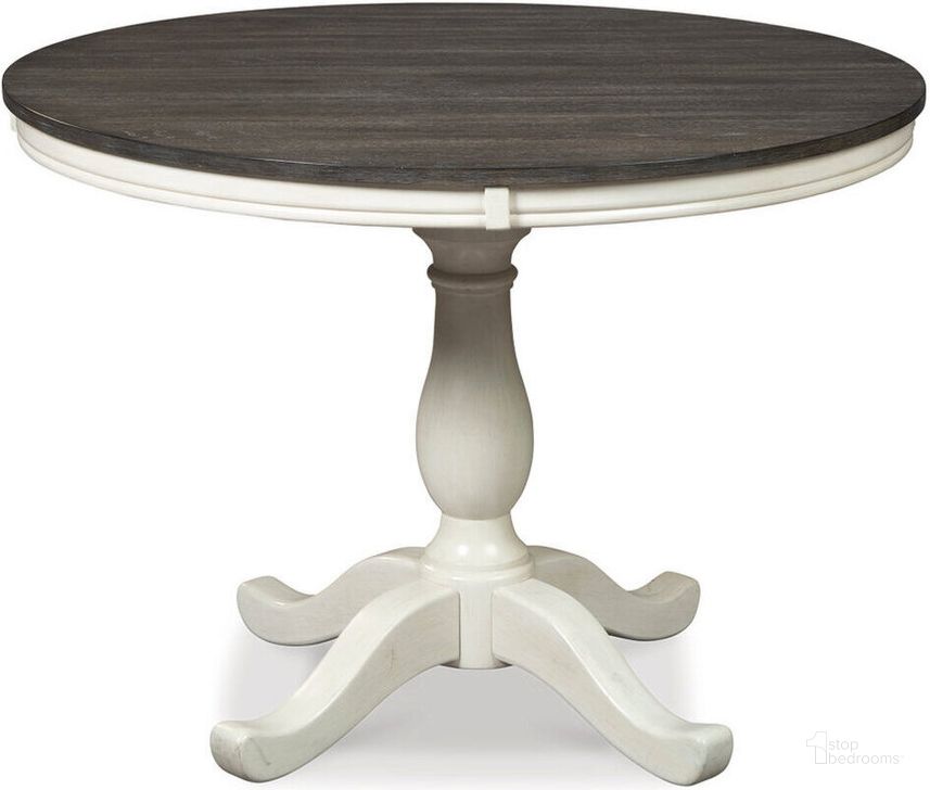 The appearance of Nelling White And Brown Round Dining Table designed by Signature Design by Ashley in the transitional interior design. This two-tone piece of furniture  was selected by 1StopBedrooms from Nelling Collection to add a touch of cosiness and style into your home. Sku: D287-15T;D287-15B. Table Base Style: Pedestal. Table Top Shape: Round. Material: Wood. Product Type: Dining Table. Image1