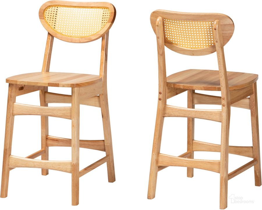 The appearance of Nenet Counter Stool Set of 2 In Oak Brown Finished Wood and Rattan designed by Baxton Studio in the transitional interior design. This oak brown piece of furniture  was selected by 1StopBedrooms from Nenet Collection to add a touch of cosiness and style into your home. Sku: RH256P-Natural Rattan/Natural Flat Seat-PC-2PK. Product Type: Barstool. Material: Rubberwood. Image1