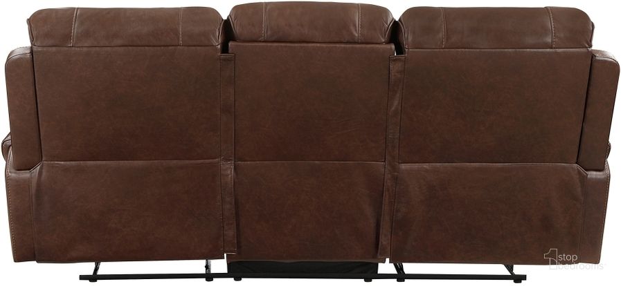 The appearance of Newnan Double Reclining Sofa with Center Drop-Down Cup Holders and USB Ports In Brown designed by Homelegance in the traditional interior design. This brown piece of furniture  was selected by 1StopBedrooms from Newnan Collection to add a touch of cosiness and style into your home. Sku: 8549BRW-3. Material: Faux Leather. Product Type: Reclining Sofa. Image1