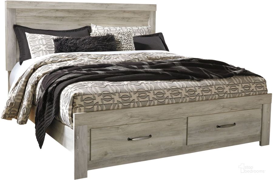 The appearance of Nickleby White Wash King Panel Bed 0qd2324147 designed by Isaac Tahari in the transitional interior design. This white wash piece of furniture  was selected by 1StopBedrooms from Nickleby Collection to add a touch of cosiness and style into your home. Sku: B331-56S;B331-58;B331-95;B100-14. Bed Type: Storage Bed. Material: Wood. Product Type: Storage Bed. Bed Size: King. Image1