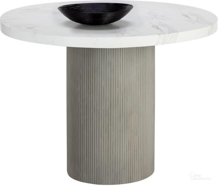 The appearance of Nicolette 40 Inch Dining Table In Light Grey And Marble Look designed by Sunpan in the modern / contemporary interior design. This light grey piece of furniture  was selected by 1StopBedrooms from Nicolette Collection to add a touch of cosiness and style into your home. Sku: 110477. Table Base Style: Pedestal. Table Top Shape: Round. Product Type: Dining Table. Material: Concrete. Size: 40". Image1