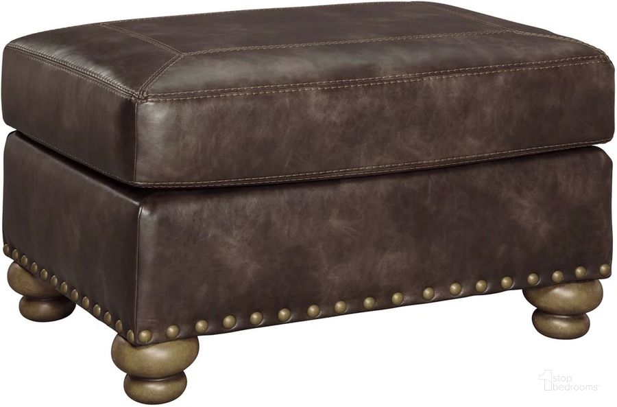The appearance of Nicorvo Ottoman In Coffee designed by Signature Design by Ashley in the traditional interior design. This coffee piece of furniture  was selected by 1StopBedrooms from Nicorvo Collection to add a touch of cosiness and style into your home. Sku: 8050514. Material: Fabric. Product Type: Ottoman. Image1
