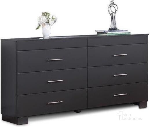 The appearance of Nivia Charcoal Dresser designed by US Tamex in the modern / contemporary interior design. This charcoal piece of furniture  was selected by 1StopBedrooms from Nivia Collection to add a touch of cosiness and style into your home. Sku: E52631-DR. Material: Wood. Product Type: Dresser. Image1
