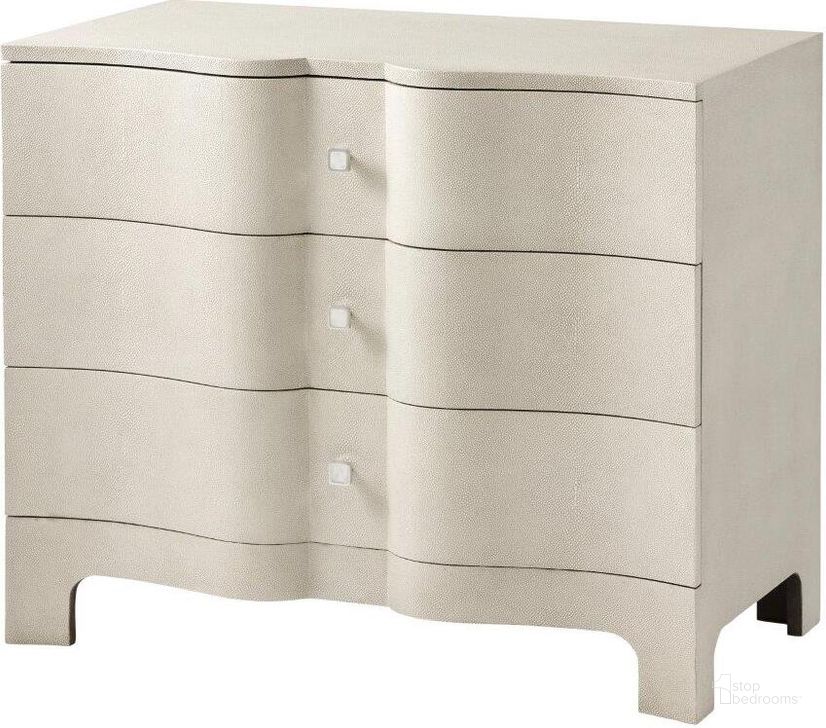 The appearance of Nolan Serpentine Chest Of Three Drawers TAS60015L designed by Theodore Alexander in the transitional interior design. This beige piece of furniture  was selected by 1StopBedrooms from TA Studio Raia Collection to add a touch of cosiness and style into your home. Sku: TAS60015L. Material: Leather. Product Type: Chest.