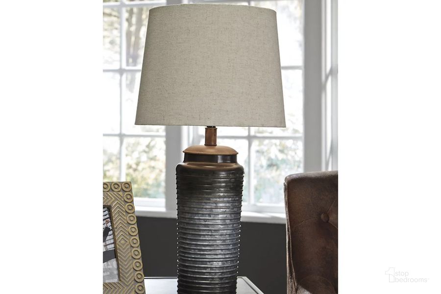 The appearance of Norbert Gray Metal Table Lamp Set of 2 designed by Signature Design by Ashley in the transitional interior design. This gray piece of furniture  was selected by 1StopBedrooms from Norbert Collection to add a touch of cosiness and style into your home. Sku: L204064. Material: Metal. Product Type: Table Lamp. Image1