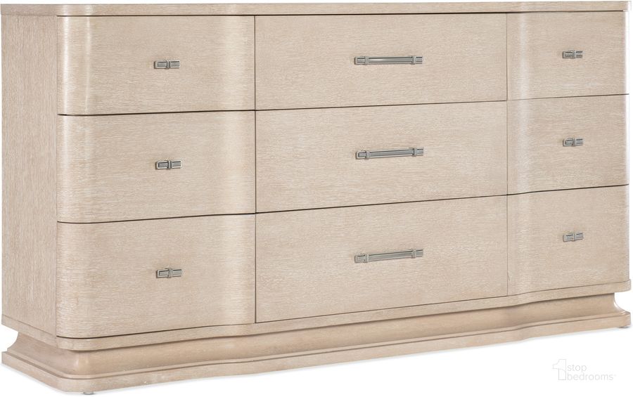 The appearance of Nouveau Chic Nine Drawer Dresser In Light Brown designed by Hooker in the transitional interior design. This light brown piece of furniture  was selected by 1StopBedrooms from Nouveau Chic Collection to add a touch of cosiness and style into your home. Sku: 6500-90002-80. Material: Wood. Product Type: Dresser. Image1