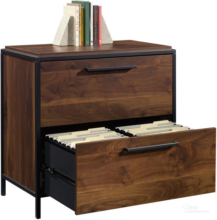 The appearance of Nova Loft Lateral File In Grand Walnut designed by Sauder in the modern / contemporary interior design. This grand walnut piece of furniture  was selected by 1StopBedrooms from Nova Loft Collection to add a touch of cosiness and style into your home. Sku: 429434. Product Type: File Cabinet. Material: Engineered Wood. Image1