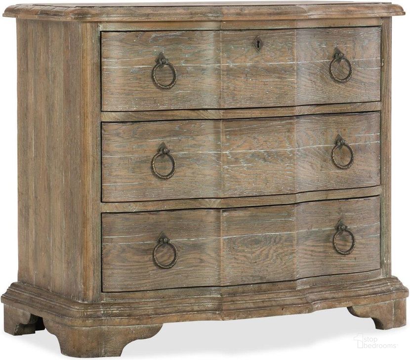 The appearance of Boheme Bastogne Three-Drawer Nightstand designed by Hooker in the traditional interior design. This brown piece of furniture  was selected by 1StopBedrooms from Boheme Collection to add a touch of cosiness and style into your home. Sku: 5750-90016-MWD. Product Type: Nightstand. Material: Poplar. Image1