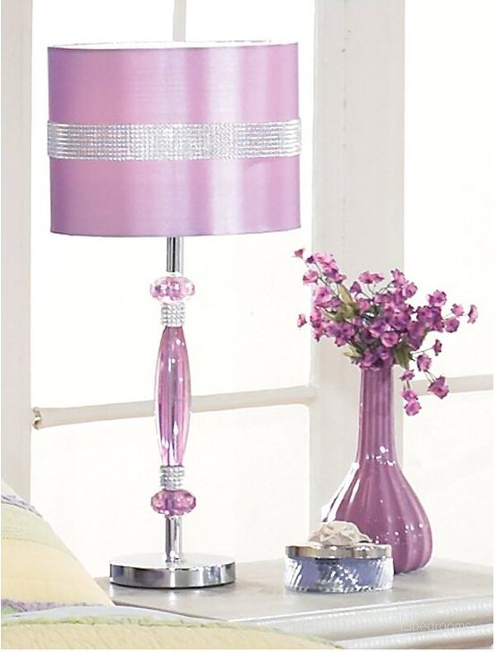 The appearance of Nyssa Table Lamp designed by Signature Design by Ashley in the modern / contemporary interior design. This purple piece of furniture  was selected by 1StopBedrooms from Nyssa Collection to add a touch of cosiness and style into your home. Sku: L801524. Material: Metal. Product Type: Table Lamp. Image1