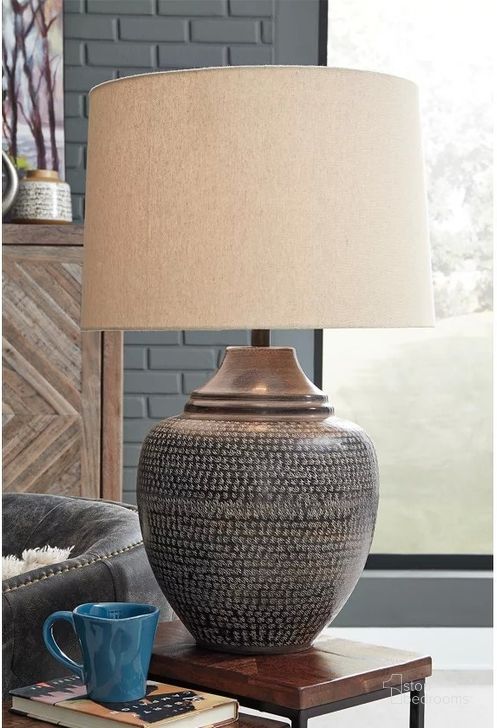 The appearance of Olinger Brown Table Lamp designed by Signature Design by Ashley in the transitional interior design. This brown piece of furniture  was selected by 1StopBedrooms from Olinger Collection to add a touch of cosiness and style into your home. Sku: L207404. Material: Metal. Product Type: Table Lamp. Image1