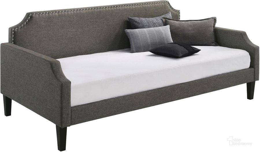 The appearance of Olivia Upholstered Twin Daybed with Nailhead Trim In Grey designed by Coaster in the transitional interior design. This grey piece of furniture  was selected by 1StopBedrooms from Olivia Collection to add a touch of cosiness and style into your home. Sku: 300636. Bed Type: Daybed. Material: Upholstered. Product Type: DayBed. Bed Size: Twin. Image1