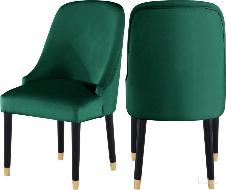The appearance of Omni Green Velvet Dining Chair Set of 2 designed by Meridian in the modern / contemporary interior design. This green velvet piece of furniture  was selected by 1StopBedrooms from Omni Collection to add a touch of cosiness and style into your home. Sku: 923Green-C. Material: Wood. Product Type: Dining Chair. Image1