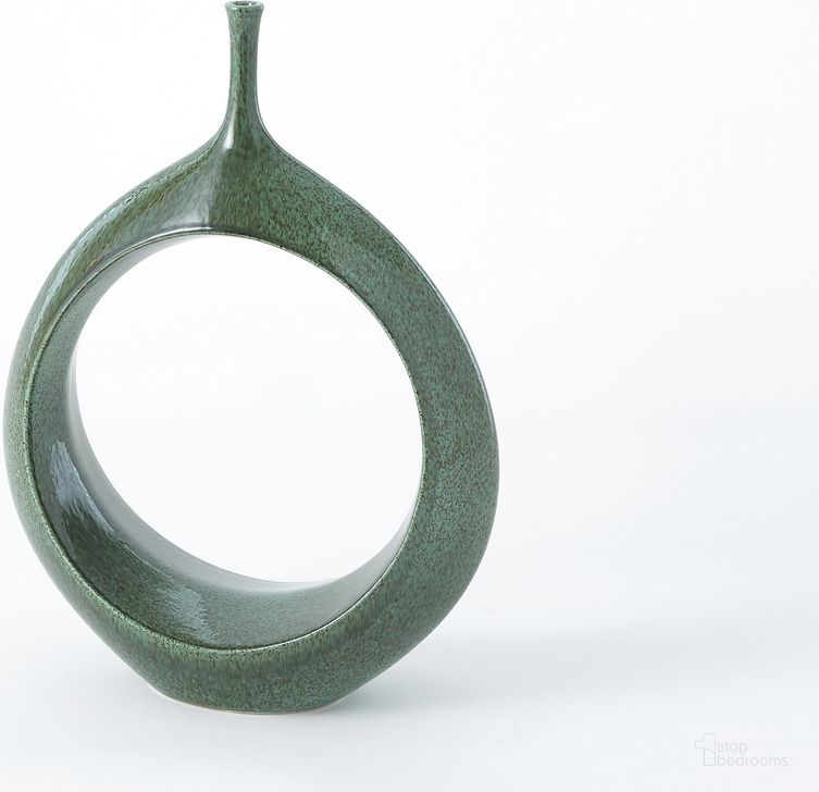 The appearance of Open Ring Small Vase In Emerald designed by Global Views in the modern / contemporary interior design. This green piece of furniture  was selected by 1StopBedrooms from Open Collection to add a touch of cosiness and style into your home. Sku: 1903. Material: Ceramic. Product Type: Vase. Image1