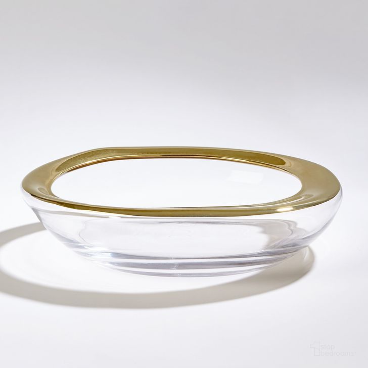 The appearance of Organic Formed Bowl In Gold Rim designed by Global Views in the modern / contemporary interior design. This clear piece of furniture  was selected by 1StopBedrooms from Organic Collection to add a touch of cosiness and style into your home. Sku: EN6.60001. Material: Glass. Product Type: Bowl. Image1