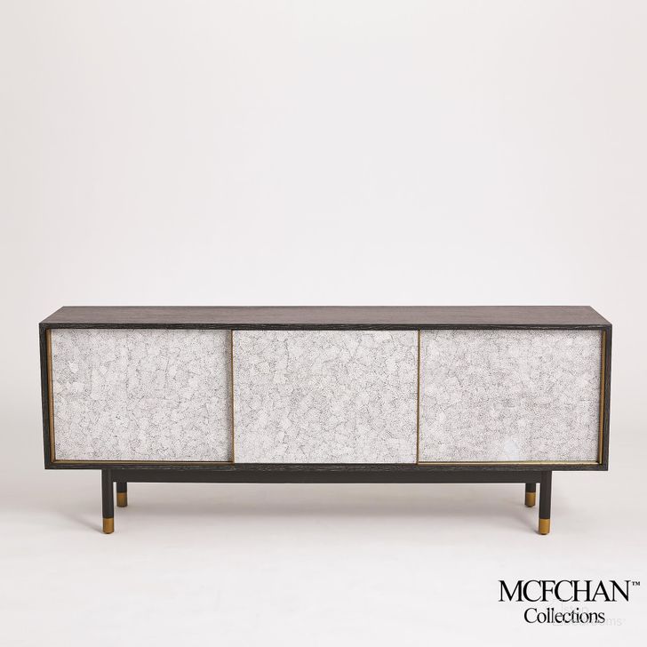The appearance of Ostara Media Cabinet In Black designed by Global Views in the modern / contemporary interior design. This black piece of furniture  was selected by 1StopBedrooms from  to add a touch of cosiness and style into your home. Sku: MC-2516. Product Type: Media Unit. Material: Brass. Image1