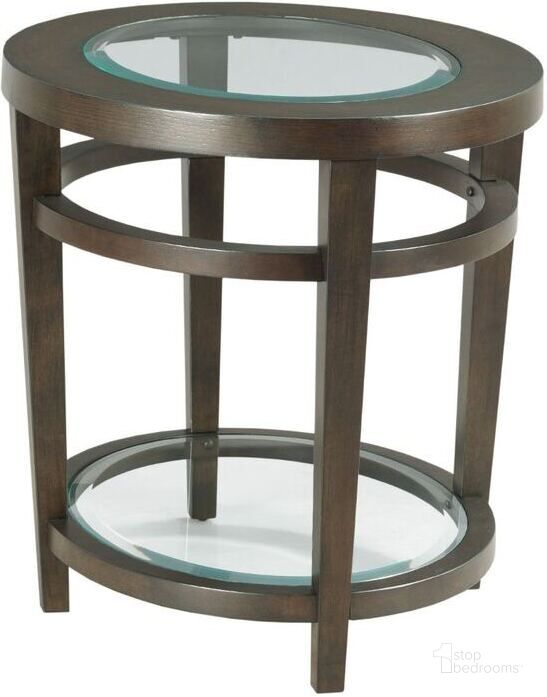 The appearance of Oval End Table designed by Hammary in the transitional interior design. This dark brown piece of furniture  was selected by 1StopBedrooms from Urbana Collection to add a touch of cosiness and style into your home. Sku: 880-918. Material: Wood. Product Type: End Table. Image1
