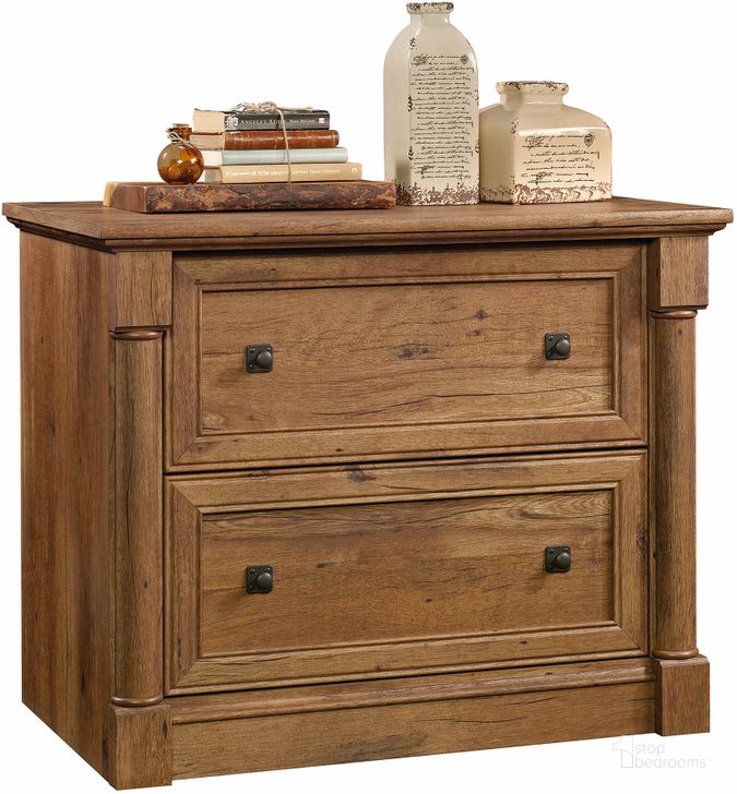 The appearance of Palladia Lateral File In Vintage Oak designed by Sauder in the traditional interior design. This vintage oak piece of furniture  was selected by 1StopBedrooms from Palladia Collection to add a touch of cosiness and style into your home. Sku: 420607. Product Type: File Cabinet. Material: Engineered Wood. Image1