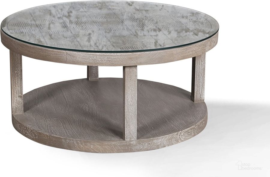The appearance of Parker House Crossings Serengeti Round Cocktail Table With Glass Top designed by Parker House in the transitional interior design. This grey piece of furniture  was selected by 1StopBedrooms from Crossings Serengeti Collection to add a touch of cosiness and style into your home. Sku: SER#11. Material: Wood. Product Type: Cocktail Table. Image1