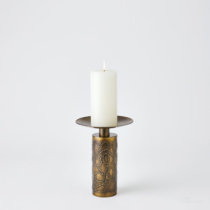 The appearance of Paten Medium Candle Holder In Antique Brass designed by Global Views in the modern / contemporary interior design. This brass piece of furniture  was selected by 1StopBedrooms from Paten Collection to add a touch of cosiness and style into your home. Sku: 7.80684. Product Type: Candle Holder. Material: Iron. Image1