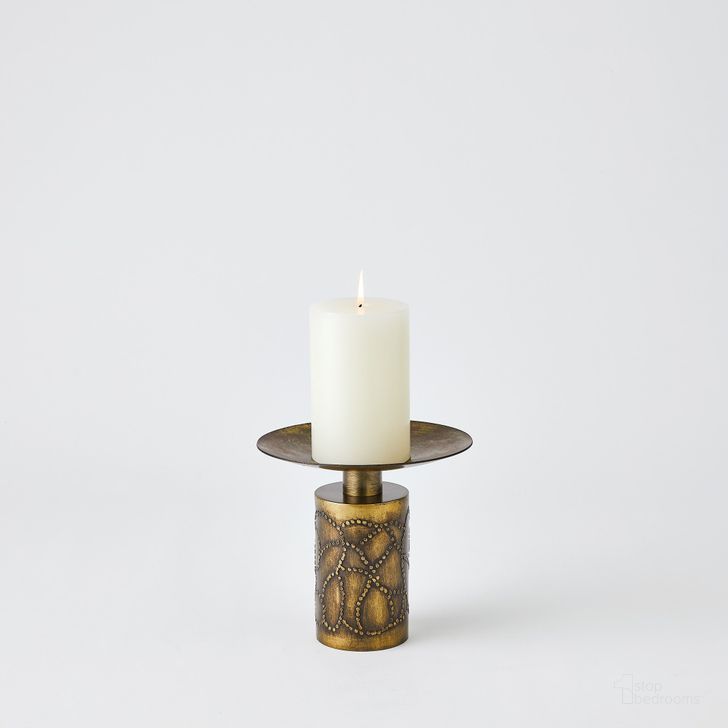 The appearance of Paten Small Candle Holder In Antique Brass designed by Global Views in the modern / contemporary interior design. This brass piece of furniture  was selected by 1StopBedrooms from Paten Collection to add a touch of cosiness and style into your home. Sku: 7.80685. Product Type: Candle Holder. Material: Iron. Image1