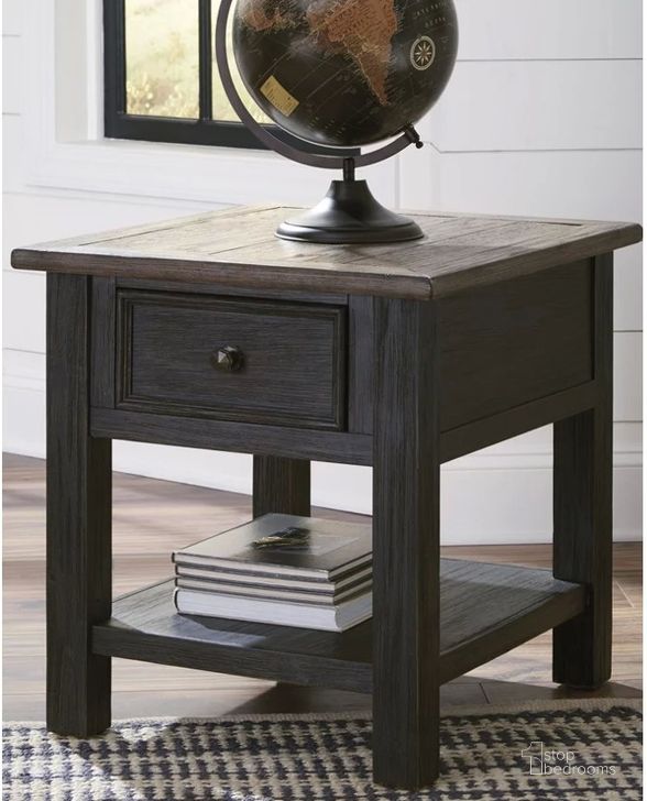 The appearance of Pendene Grayish Brown/Black End Table designed by Isaac Tahari in the transitional interior design. This grayish brown/black piece of furniture  was selected by 1StopBedrooms from Pendene Collection to add a touch of cosiness and style into your home. Sku: T736-3. Material: Wood. Product Type: End Table. Table Top Shape: Rectangular. Image1