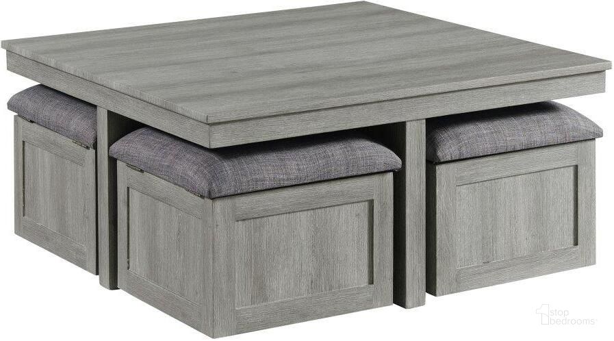The appearance of Picket House Furnishings Dawson Coffee Table With Four Storage Stools In Grey designed by Picket House in the modern / contemporary interior design. This light grey piece of furniture  was selected by 1StopBedrooms from Dawson Collection to add a touch of cosiness and style into your home. Sku: CTUT100OT. Product Type: Coffee Table. Material: MDF. Image1