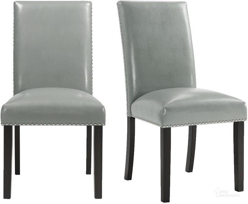 The appearance of Picket House Furnishings Pia Faux Leather Dining Side Chair Set 2 In Grey designed by Picket House in the transitional interior design. This grey piece of furniture  was selected by 1StopBedrooms from Pia Collection to add a touch of cosiness and style into your home. Sku: DMI300SC. Product Type: Side Chair. Material: Rubberwood. Image1