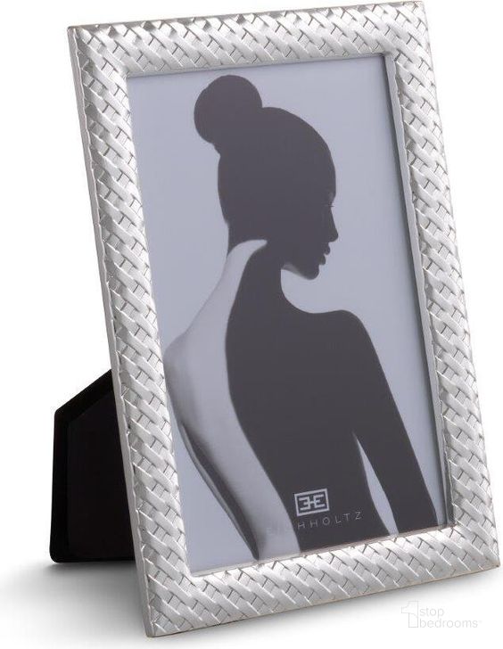 The appearance of Picture Frame Chiva S Silver Finish Set Of 6 designed by Eichholtz in the modern / contemporary interior design. This silver piece of furniture  was selected by 1StopBedrooms from Chiva Collection to add a touch of cosiness and style into your home. Sku: 115901. Material: Glass. Product Type: Decorative Accessory.