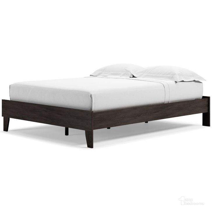 The appearance of Piperton Black Queen Platform Bed designed by Signature Design by Ashley in the modern / contemporary interior design. This black piece of furniture  was selected by 1StopBedrooms from Piperton Collection to add a touch of cosiness and style into your home. Sku: EB5514-113. Bed Type: Platform Bed. Material: Wood. Product Type: Platform Bed. Bed Size: Queen. Image1