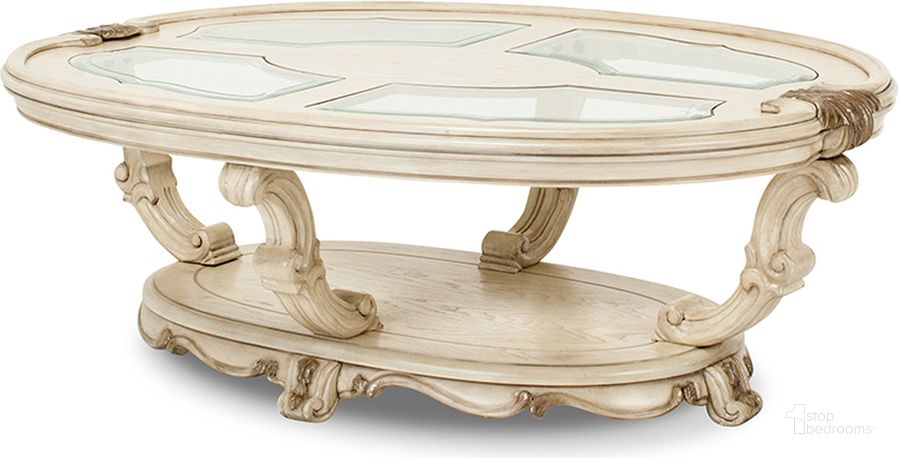 The appearance of Platine De Royale Oval Cocktail Table In Champagne designed by AICO in the traditional interior design. This champagne piece of furniture  was selected by 1StopBedrooms from Platine De Royale Collection to add a touch of cosiness and style into your home. Sku: NR09201-201. Table Base Style: Legs. Table Top Shape: Round. Material: Wood. Product Type: Cocktail Table. Image1