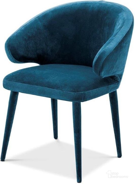 The appearance of Powmino Blue Dining Chair designed by Luxe Linea in the modern / contemporary interior design. This blue piece of furniture  was selected by 1StopBedrooms from Powmino Collection to add a touch of cosiness and style into your home. Sku: A112067. Product Type: Dining Chair. Material: Velvet. Image1