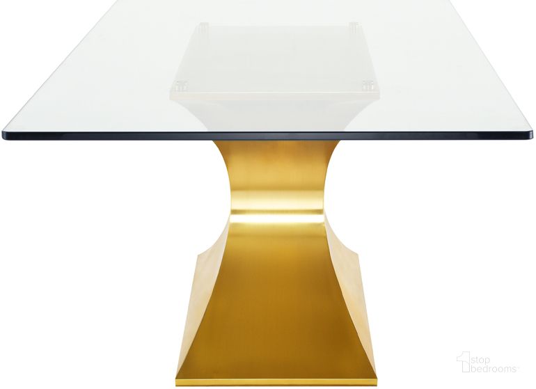 The appearance of Praetorian Glass Glass Dining Table HGSX224 designed by Nuevo in the modern / contemporary interior design. This gold piece of furniture  was selected by 1StopBedrooms from Praetorian Collection to add a touch of cosiness and style into your home. Sku: HGSX224. Table Base Style: Pedestal. Material: Glass. Product Type: Dining Table. Table Top Shape: Rectangular. Size: 42". Image1