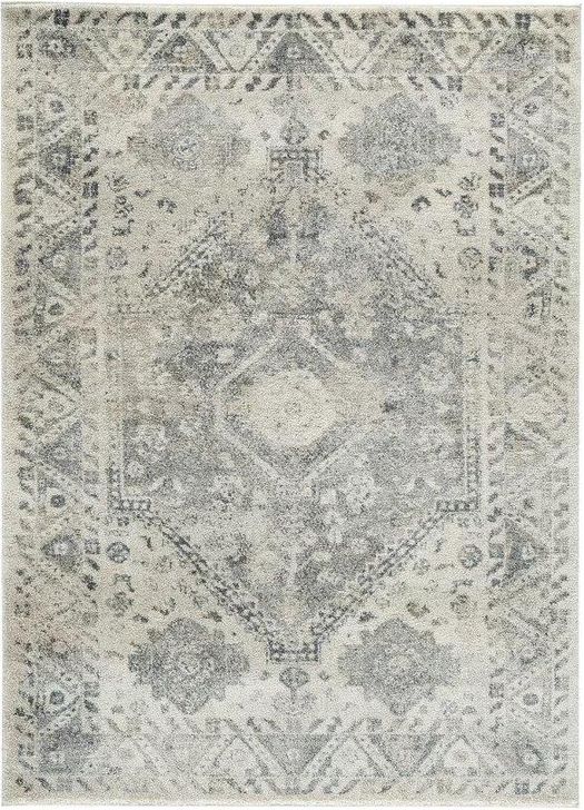 The appearance of Precia Gray and Cream Medium Rug designed by Signature Design by Ashley in the modern / contemporary interior design. This gray/cream piece of furniture  was selected by 1StopBedrooms from Precia Collection to add a touch of cosiness and style into your home. Sku: R404132. Product Type: Rug. Image1