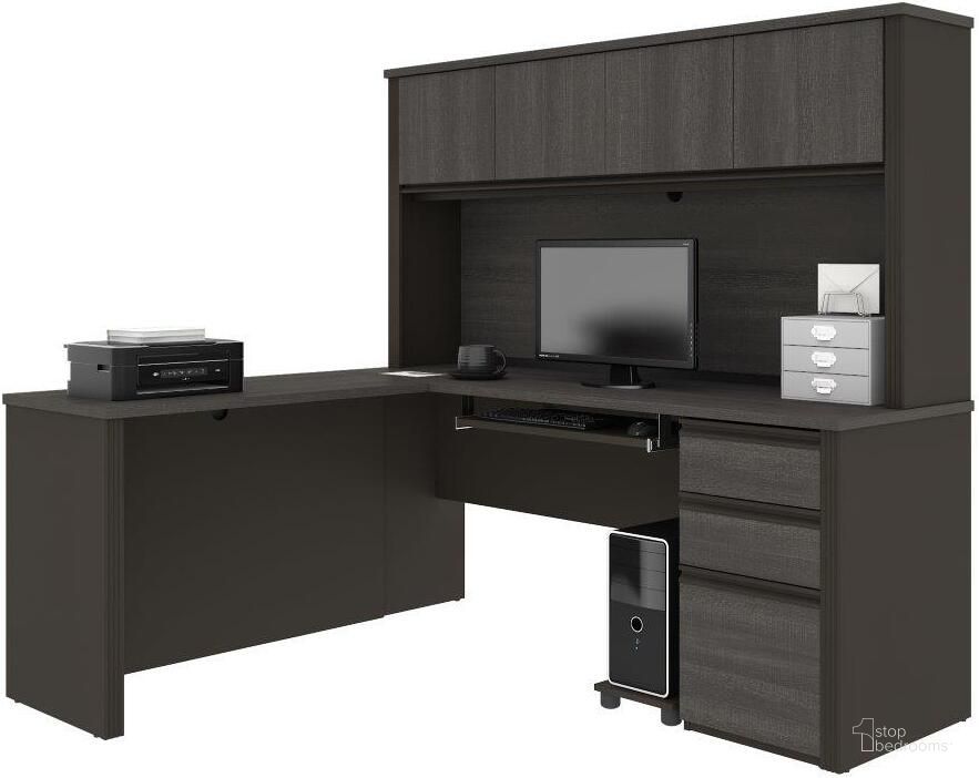 The appearance of Prestige + L-shaped workstation including one pedestal in Bark Gray and Slate 99872-000047 designed by Bestar in the modern / contemporary interior design. This slate piece of furniture  was selected by 1StopBedrooms from Prestige Plus Collection to add a touch of cosiness and style into your home. Sku: 99872-000047. Material: Wood. Product Type: Work Station. Image1