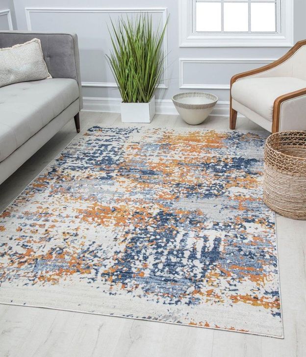 The appearance of Preston PS50A Sapphire Gold Splatter Transitional Vintage Blue 8' x 10' Area Rug designed by Rugs America in the transitional interior design. This blue piece of furniture  was selected by 1StopBedrooms from Preston Collection to add a touch of cosiness and style into your home. Sku: RA30177. Material: Polypropylene. Product Type: Area Rugs. Image1