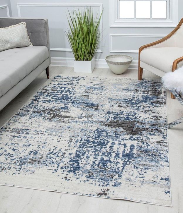 The appearance of Preston PS50B Ivory Sapphire Splatter Transitional Vintage White 2' x 8' Area Rug designed by Rugs America in the transitional interior design. This white piece of furniture  was selected by 1StopBedrooms from Preston Collection to add a touch of cosiness and style into your home. Sku: RA30179. Material: Polypropylene. Product Type: Area Rugs. Image1