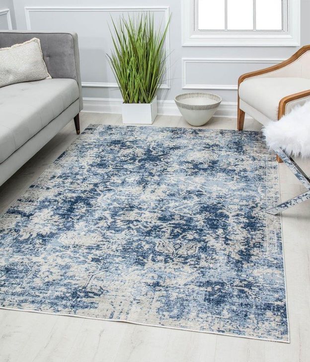 The appearance of Preston PS55A Monterey Blue Transitional Vintage Blue 5' x 7' Area Rug designed by Rugs America in the transitional interior design. This blue piece of furniture  was selected by 1StopBedrooms from Preston Collection to add a touch of cosiness and style into your home. Sku: RA30184. Material: Polypropylene. Product Type: Area Rugs. Image1