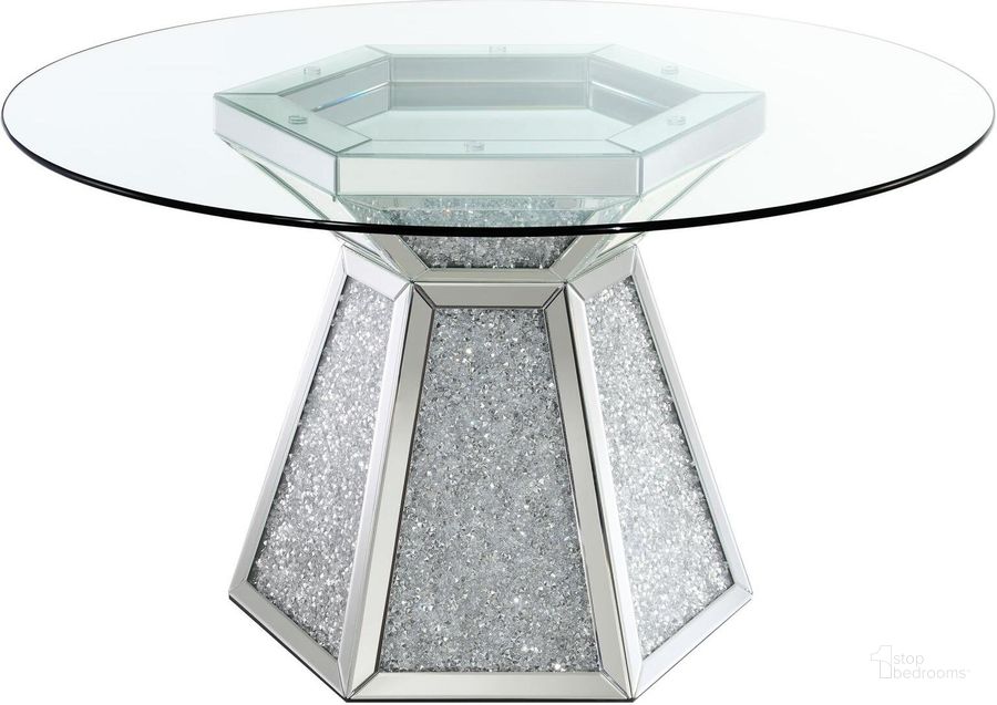 The appearance of Quinn Hexagon Pedestal Glass Top Dining Table In Mirror designed by Coaster in the glam interior design. This mirror piece of furniture  was selected by 1StopBedrooms from Quinn Collection to add a touch of cosiness and style into your home. Sku: 115561B1;CP52RD-12. Material: Glass. Product Type: Dining Table. Size: 52". Image1