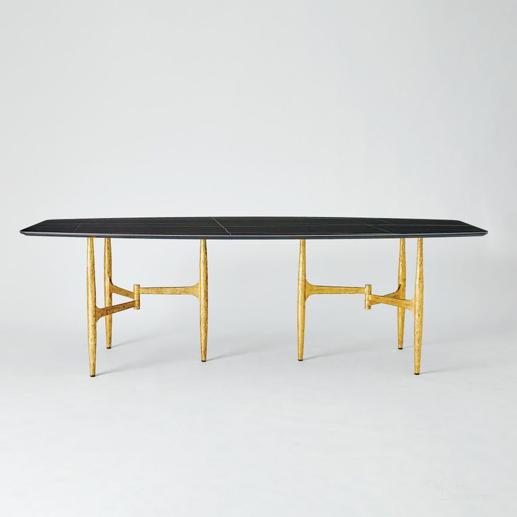 The appearance of Radius Rectangle Table In Gold And Noir Lux Top designed by Global Views in the modern / contemporary interior design. This black piece of furniture  was selected by 1StopBedrooms from Radius Collection to add a touch of cosiness and style into your home. Sku: 7.91579. Product Type: Table. Material: Iron. Image1