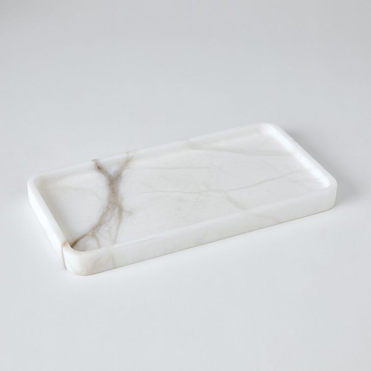 The appearance of Raggio Alabaster Tray In White designed by Global Views in the modern / contemporary interior design. This white piece of furniture  was selected by 1StopBedrooms from Raggio Collection to add a touch of cosiness and style into your home. Sku: 7.30236. Product Type: Tray. Material: Alabaster. Image1
