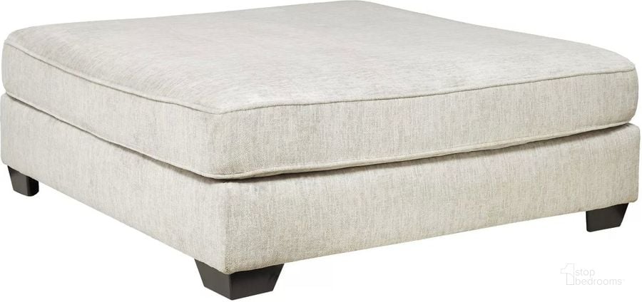 The appearance of Rawcliffe Parchment Oversized Accent Ottoman designed by Signature Design by Ashley in the transitional interior design. This parchment piece of furniture  was selected by 1StopBedrooms from Rawcliffe Collection to add a touch of cosiness and style into your home. Sku: 1960408. Material: Fabric. Product Type: Ottoman. Image1