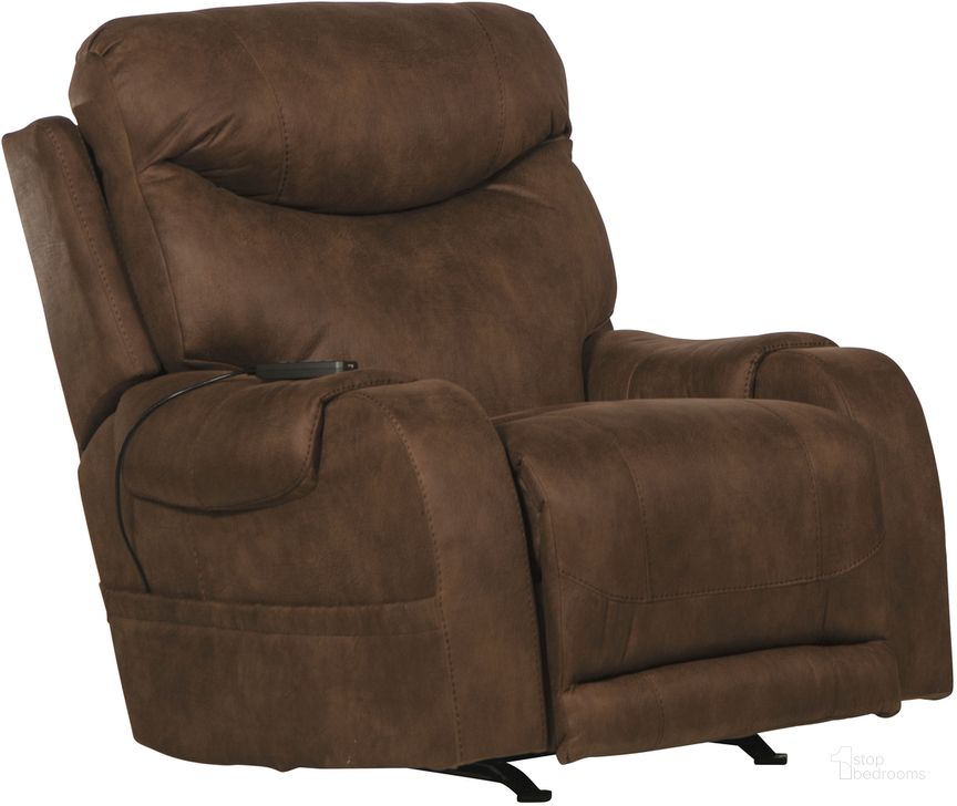 The appearance of Recharger Power Rocker Recliner with Power Adjustable Headrest In Chocolate designed by Catnapper in the traditional interior design. This chocolate piece of furniture  was selected by 1StopBedrooms from Recharger Collection to add a touch of cosiness and style into your home. Sku: 641022142879. Material: Fabric. Product Type: Rocker Recliner. Image1