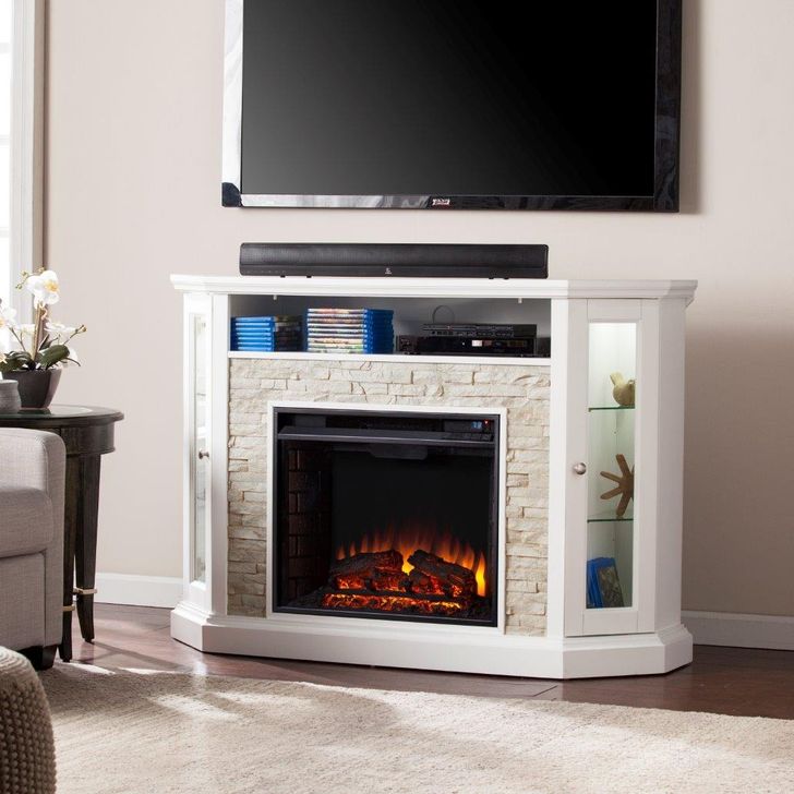 The appearance of Redden Corner Convertible Electric Media Fireplace In White designed by SEI Furniture in the transitional interior design. This white piece of furniture  was selected by 1StopBedrooms from Redden Collection to add a touch of cosiness and style into your home. Sku: FE9393. Product Type: Fireplace. Material: MDF. Image1