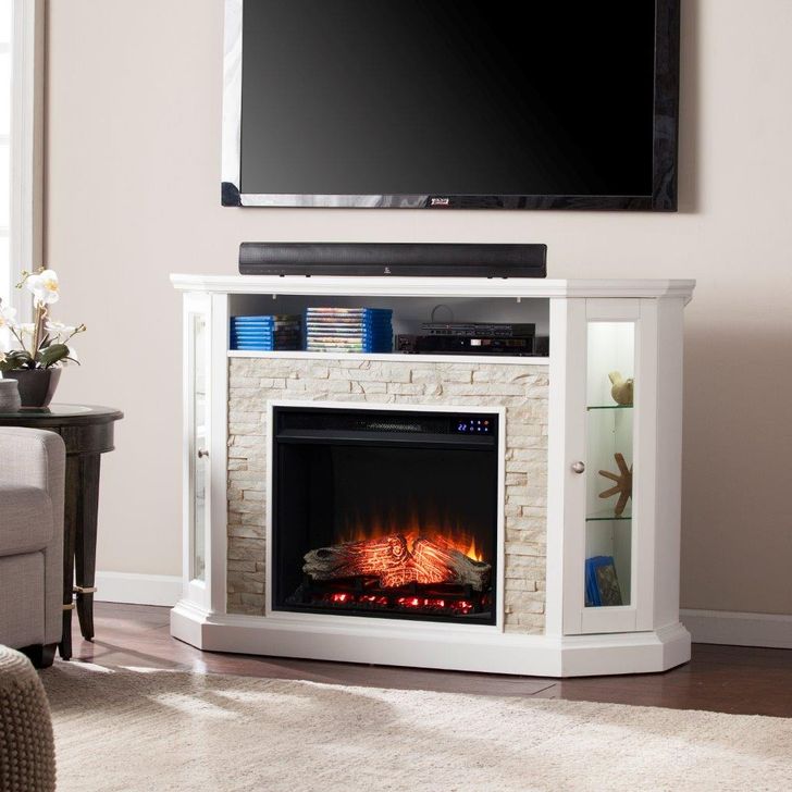 The appearance of Redden Corner Convertible Touch Screen Electric Fireplace With Storage In White designed by SEI Furniture in the transitional interior design. This white piece of furniture  was selected by 1StopBedrooms from Redden Collection to add a touch of cosiness and style into your home. Sku: FR9393. Material: Wood. Product Type: Fireplace. Image1